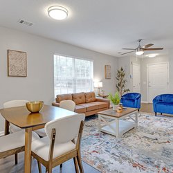 living room at Lakeview Oaks Apartments in Savannah, GA